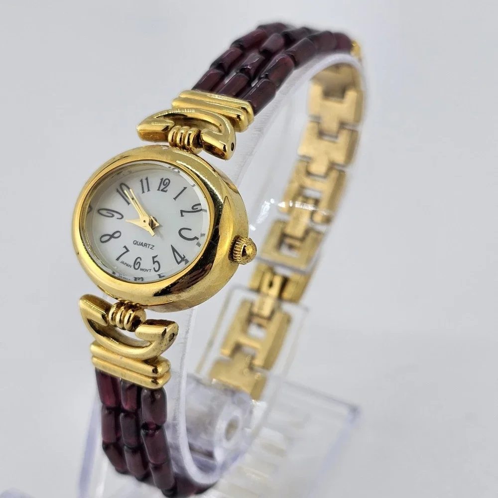 Women's Analog Watch‎ 25MM Light Yellow Dial Gold Purple Bands 6.75